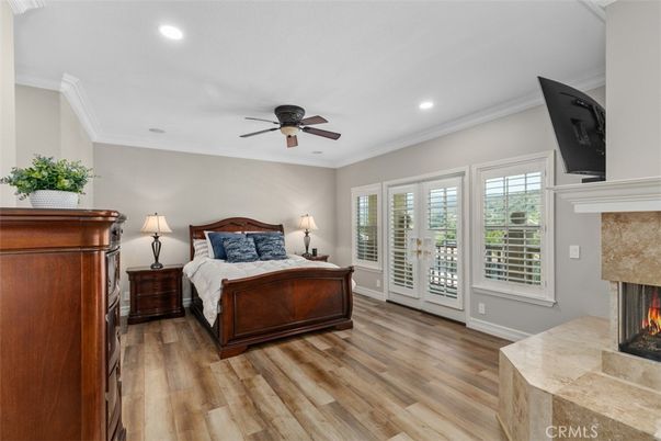 Bedroom, Fireplace, Interior, Recessed Lighting, Wood Texture Flooring