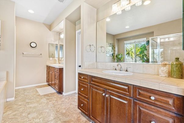 Bathroom, Dual Sink Vanities, Glass Shower, Interior, Recessed Lighting, Tile Countertops