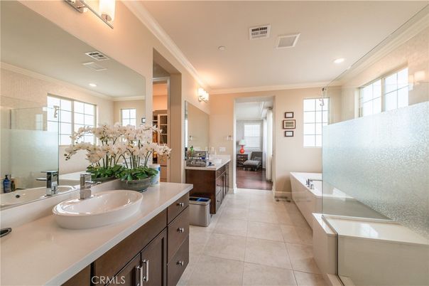 Bathroom, Dual Sink Vanities, Glass Shower, Interior, Recessed Lighting, Wood Texture Flooring