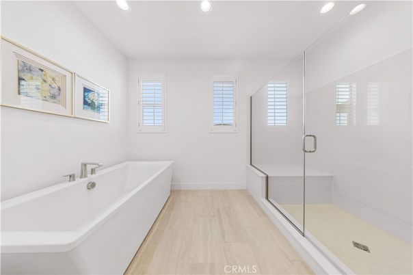 Bathroom, Free Standing Baths, Glass Shower, Interior, Recessed Lighting, Wood Texture Flooring