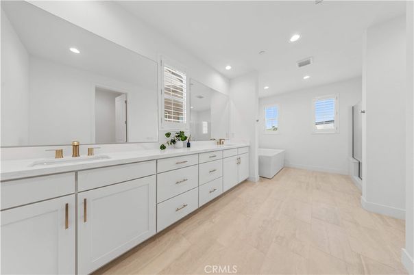 Bathroom, Dual Sink Vanities, Interior, Recessed Lighting, Wood Texture Flooring