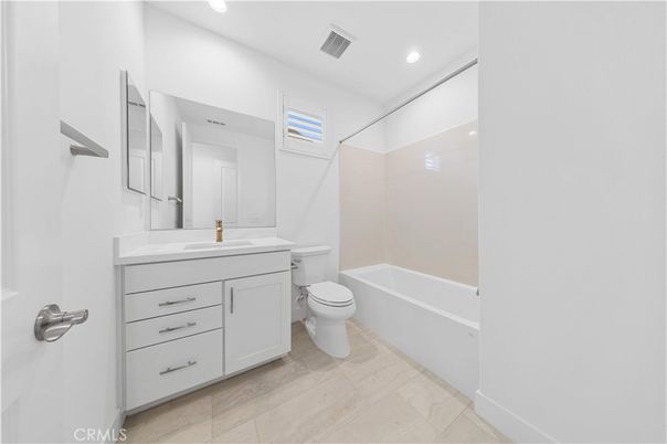 Bathroom, Dual Sink Vanities, Interior, Recessed Lighting, Wood Texture Flooring