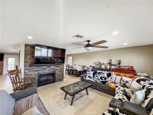 Dining room, Fireplace, Interior, Living room, Recessed Lighting, Stone Walls