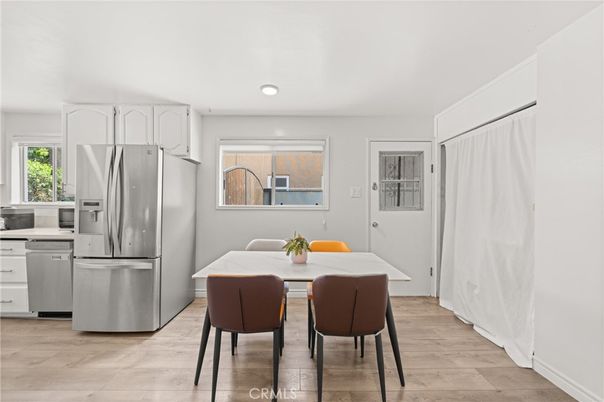 Dining room, Interior, Kitchen, Recessed Lighting, Stainless Steel Appliances, Wood Texture Flooring