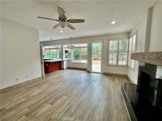 Empty room, Fireplace, Interior, Pendant Lights, Recessed Lighting, Wood Texture Flooring