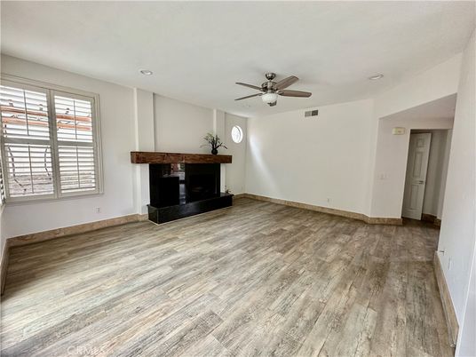 Empty room, Fireplace, Interior, Recessed Lighting, Wood Texture Flooring