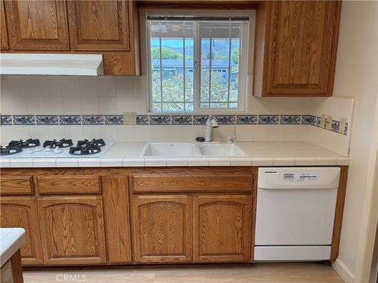 Interior, Kitchen, Tile Countertops, Wood Texture Flooring