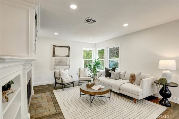 Fireplace, Interior, Living room, Recessed Lighting, Wood Texture Flooring