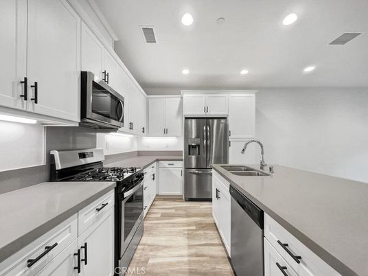 Interior, Kitchen, Recessed Lighting, Stainless Steel Appliances, Wood Texture Flooring