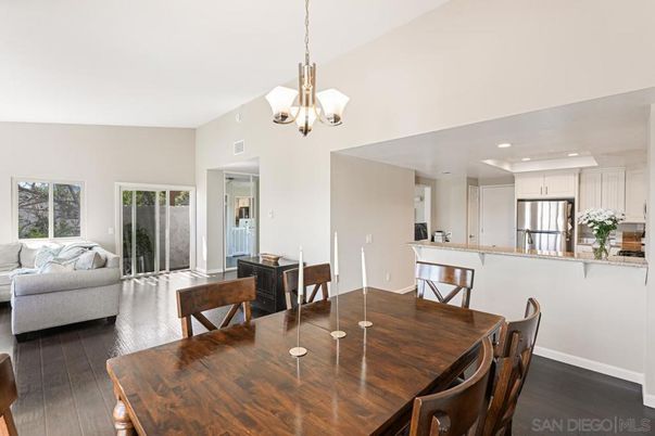 Chandelier, Dining room, Interior, Kitchen, Living room, Recessed Lighting, Stainless Steel Appliances, Wood Texture Flooring