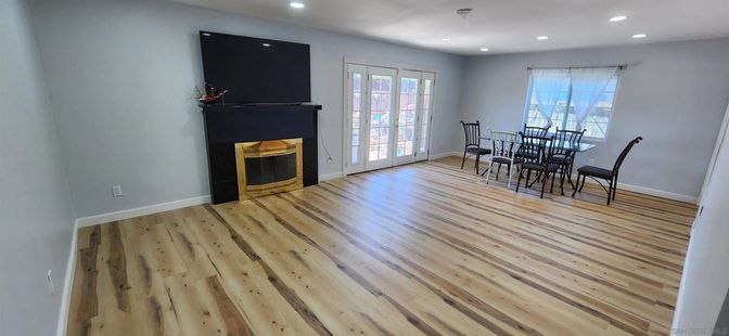 Dining room, Fireplace, Interior, Recessed Lighting, Wood Texture Flooring