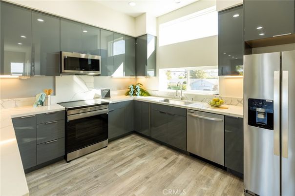Interior, Kitchen, Recessed Lighting, Stainless Steel Appliances, Wood Texture Flooring