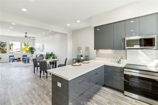 Dining room, Interior, Kitchen, Recessed Lighting, Stainless Steel Appliances, Wood Texture Flooring