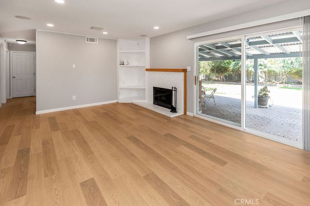Empty room, Fireplace, Interior, Recessed Lighting, Wood Texture Flooring
