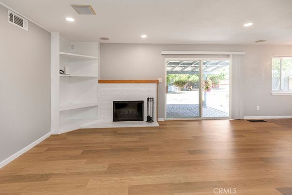 Empty room, Fireplace, Interior, Recessed Lighting, Wood Texture Flooring