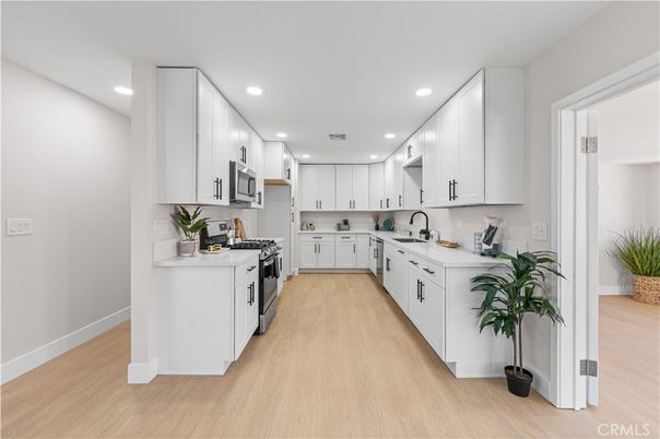 Interior, Kitchen, Recessed Lighting, Stainless Steel Appliances, Wood Texture Flooring