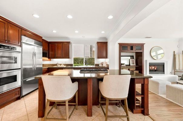 Fireplace, Interior, Kitchen, Recessed Lighting, Stainless Steel Appliances, Wood Texture Flooring