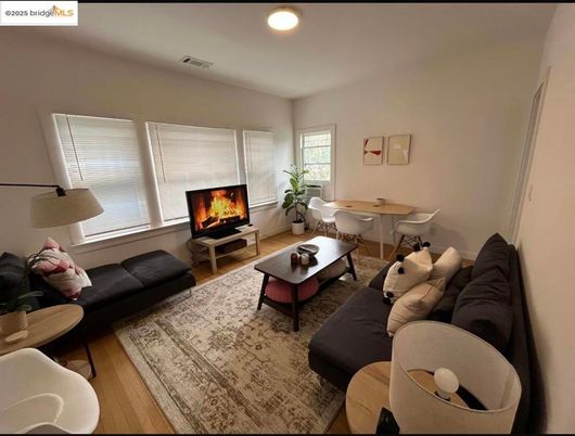 Dining room, Fireplace, Interior, Living room, Recessed Lighting, Wood Texture Flooring