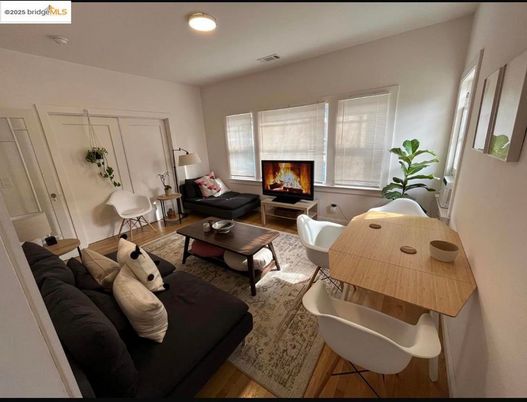 Dining room, Fireplace, Interior, Living room, Recessed Lighting, Wood Texture Flooring