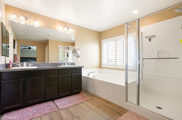 Bathroom, Dual Sink Vanities, Glass Shower, Interior, Recessed Lighting, Wood Texture Flooring