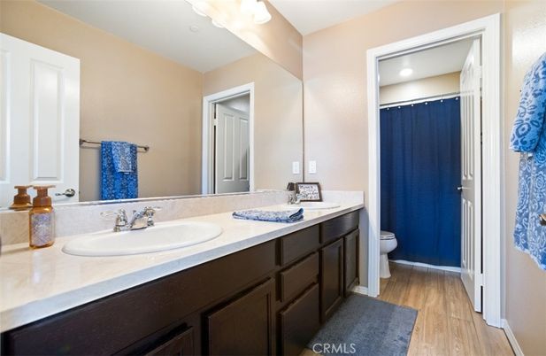 Bathroom, Dual Sink Vanities, Interior, Recessed Lighting, Wood Texture Flooring