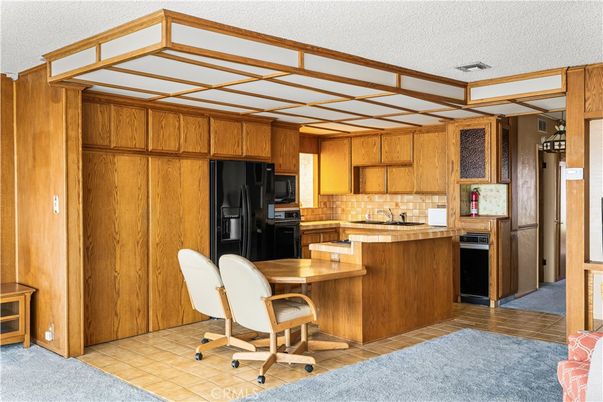 Interior, Kitchen, Tile Countertops, Wooden Walls