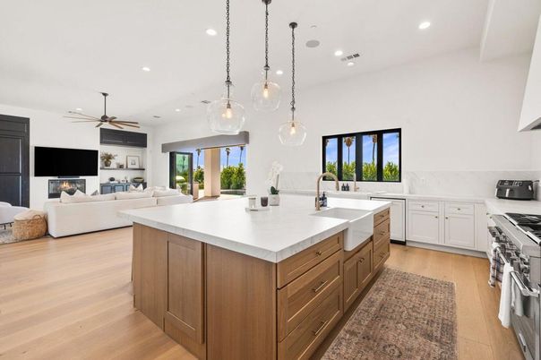 Fireplace, Interior, Kitchen, Living room, Pendant Lights, Recessed Lighting, Stainless Steel Appliances, Wood Texture Flooring
