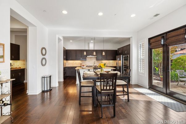 Dining room, Interior, Kitchen, Pendant Lights, Recessed Lighting, Stainless Steel Appliances, Wood Texture Flooring