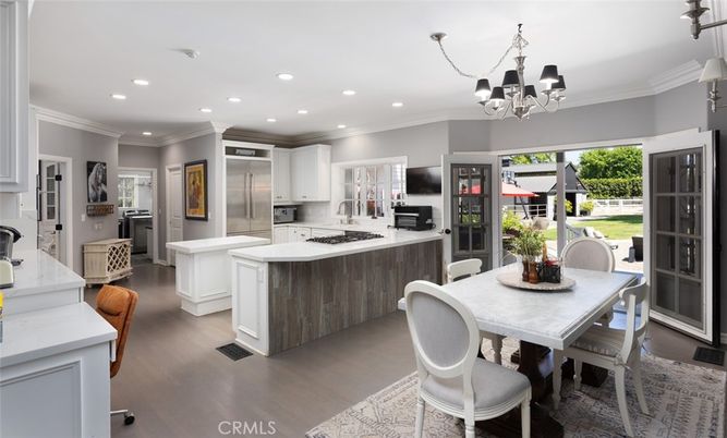 Chandelier, Dining room, Interior, Kitchen, Recessed Lighting, Stainless Steel Appliances, Wood Texture Flooring