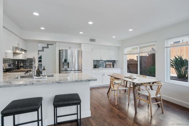 Dining room, Interior, Kitchen, Recessed Lighting, Stainless Steel Appliances, Wood Texture Flooring