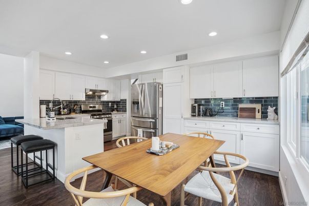 Dining room, Interior, Kitchen, Recessed Lighting, Stainless Steel Appliances, Wood Texture Flooring
