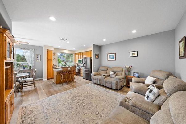 Dining room, Interior, Kitchen, Living room, Recessed Lighting, Stainless Steel Appliances, Wood Texture Flooring