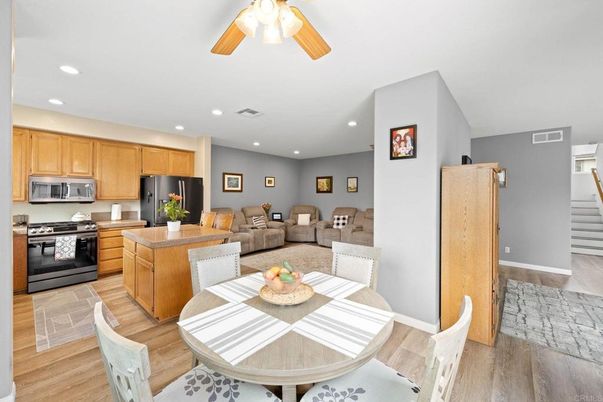Dining room, Interior, Kitchen, Living room, Recessed Lighting, Stainless Steel Appliances, Wood Texture Flooring