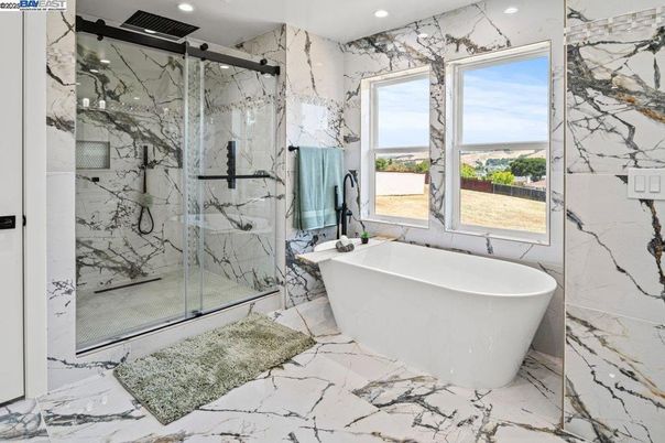 Bathroom, Free Standing Baths, Glass Shower, Interior, Marble, Marble Walls, Recessed Lighting