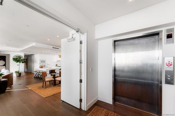 Dining room, Elevator, Interior, Kitchen, Recessed Lighting, Wood Texture Flooring