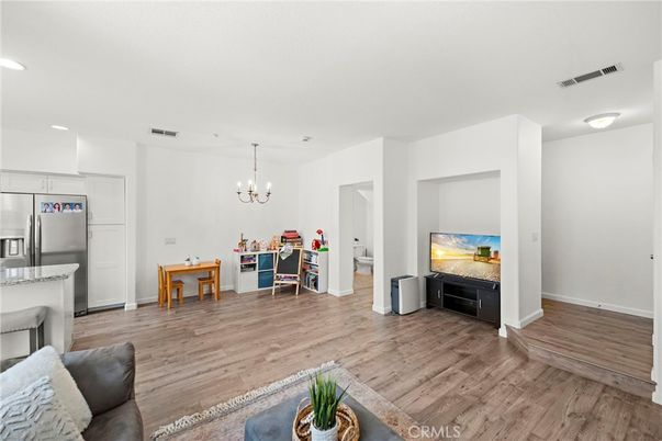 Chandelier, Interior, Kitchen, Recessed Lighting, Stainless Steel Appliances, Wood Texture Flooring