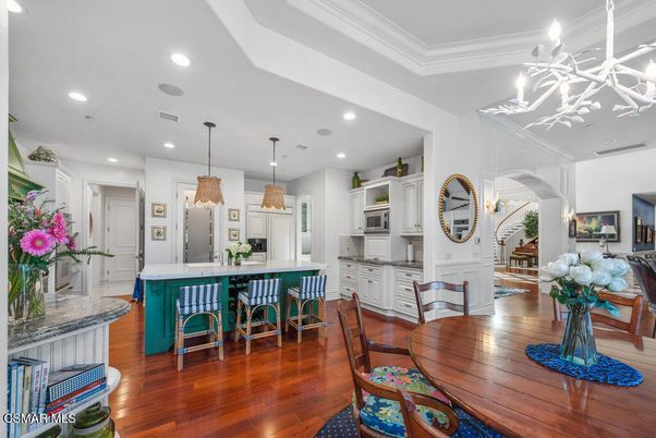 Dining room, Interior, Kitchen, Pendant Lights, Recessed Lighting, Stainless Steel Appliances, Wood Texture Flooring