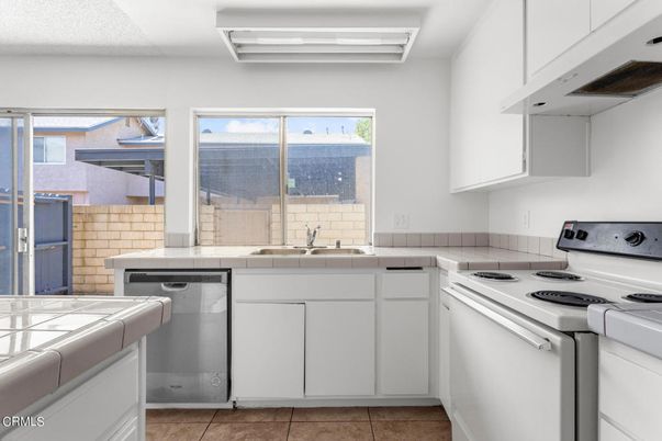 Interior, Kitchen, Stainless Steel Appliances, Tile Countertops