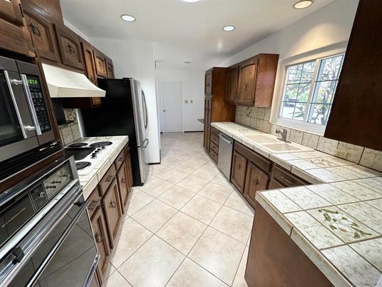 Interior, Kitchen, Recessed Lighting, Tile Countertops