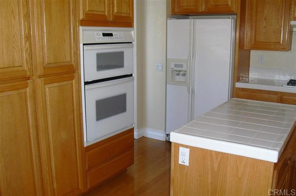 Interior, Kitchen, Tile Countertops, Wood Texture Flooring