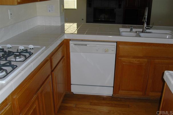Interior, Kitchen, Tile Countertops, Wood Texture Flooring