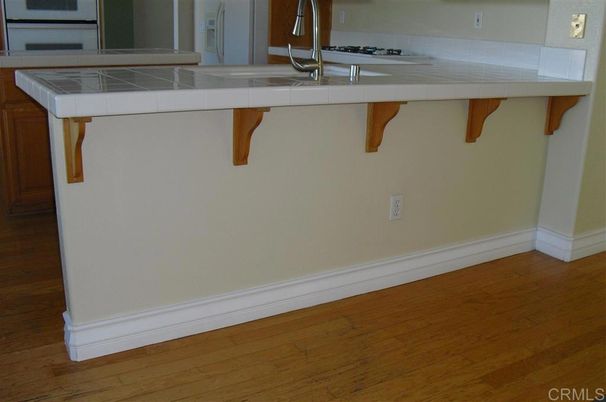Interior, Kitchen, Tile Countertops, Wood Texture Flooring