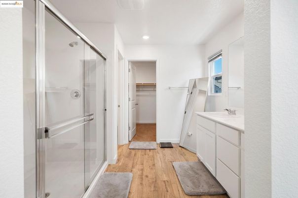 Bathroom, Glass Shower, Interior, Recessed Lighting, Walk-in Closets, Wood Texture Flooring