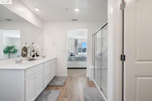 Bathroom, Bedroom, Dual Sink Vanities, Glass Shower, Interior, Recessed Lighting, Wood Texture Flooring