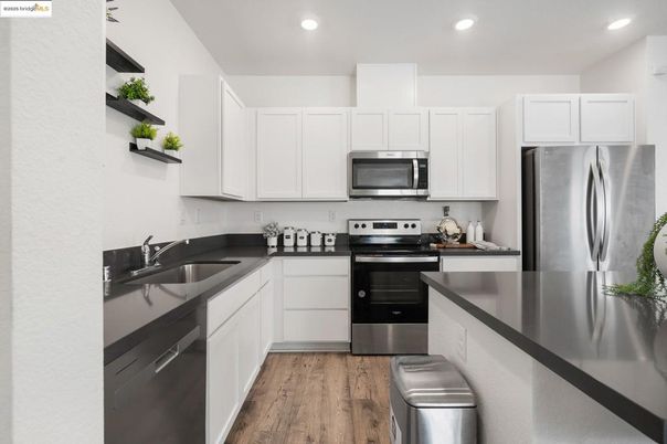 Interior, Kitchen, Recessed Lighting, Stainless Steel Appliances, Wood Texture Flooring