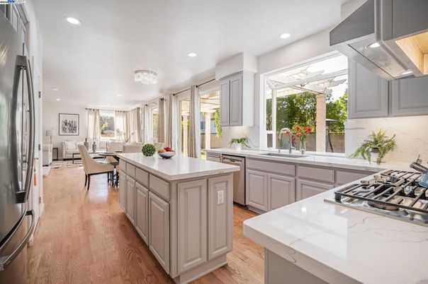 Dining room, Interior, Kitchen, Recessed Lighting, Stainless Steel Appliances, Wood Texture Flooring