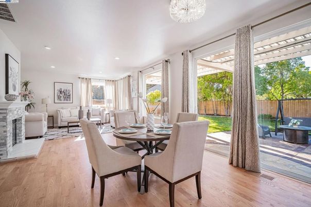Chandelier, Dining room, Fireplace, Interior, Living room, Recessed Lighting, Wood Texture Flooring