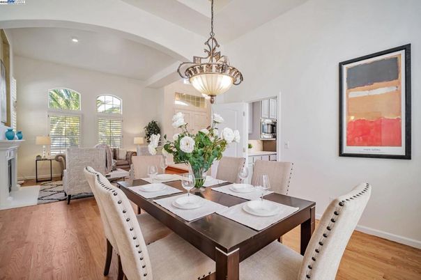Dining room, Fireplace, Interior, Living room, Pendant Lights, Recessed Lighting, Wood Texture Flooring