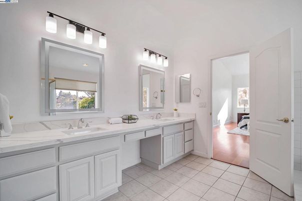 Bathroom, Dual Sink Vanities, Interior, Recessed Lighting, Wood Texture Flooring