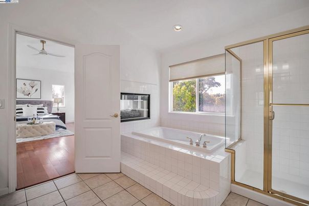 Bathroom, Bedroom, Glass Shower, Interior, Recessed Lighting, Wood Texture Flooring